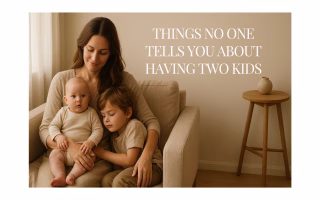 A mother sitting on a sofa with her baby and toddler, sharing a quiet, emotional moment that reflects the reality of having two kids